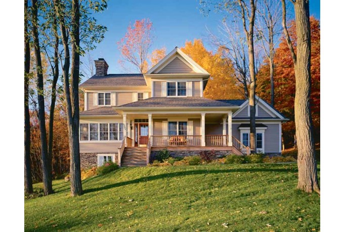 Неброский дизайн загородного дома на фото в стиле кантри напоминает сельские фермерские дома викторианской эпохи Англии